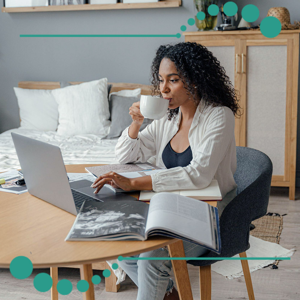 Someone working from home browsing their laptop